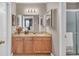 Neutral bathroom with a walk-in shower and granite topped vanity at 1705 Brighton Pt, Atlanta, GA 30328