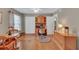 Bright bedroom features hardwood floors, a built-in desk, and natural light at 1705 Brighton Pt, Atlanta, GA 30328