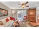 Bright living room featuring hardwood floors and access to outdoor fenced-in patio at 1705 Brighton Pt, Atlanta, GA 30328