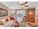 Cozy living room with hardwood floors, access to a patio, and bright natural light at 1705 Brighton Pt, Atlanta, GA 30328