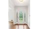 Inviting foyer features pristine white walls, beautiful hardwood floors and natural light at 3292 Ferncliff Ne Pl, Atlanta, GA 30324