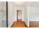 Bright foyer showcasing beautiful hardwood floors, fresh paint and a welcoming atmosphere at 3292 Ferncliff Ne Pl, Atlanta, GA 30324