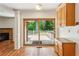 The eat-in kitchen has access to a stone patio through a glass sliding door at 3292 Ferncliff Ne Pl, Atlanta, GA 30324