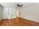 A cozy living room features hardwood floors, custom built-ins, and a light neutral paint color at 3292 Ferncliff Ne Pl, Atlanta, GA 30324