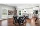 Bright dining area adjacent to kitchen with round table and pop art comic book decorations at 3423 Jamont Blvd, Alpharetta, GA 30022