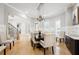 Elegant dining room features a large table, stylish chairs, and sophisticated lighting at 3423 Jamont Blvd, Alpharetta, GA 30022