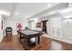 Spacious game room with a pool table and hardwood floors, perfect for entertaining friends at 3423 Jamont Blvd, Alpharetta, GA 30022