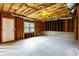 Unfinished basement is framed with studs, has a concrete floor, and exposed ceiling with insulation at 4045 Hillcrest View Ct, Suwanee, GA 30024