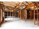 Open unfinished basement with stud framing, concrete walls and floor, and exposed ceiling at 4045 Hillcrest View Ct, Suwanee, GA 30024