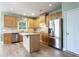 Spacious kitchen featuring stainless steel appliances and an island at 4045 Hillcrest View Ct, Suwanee, GA 30024