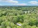 A charming home nestled in a lush, green, heavily-wooded area, offering privacy and a natural setting at 415 Haven Ln, Marietta, GA 30066