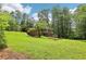 Large backyard with deck and mature trees at 415 Haven Ln, Marietta, GA 30066