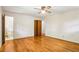 Spacious bedroom features hardwood floors, closet, and ensuite bathroom at 415 Haven Ln, Marietta, GA 30066