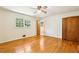 Bedroom featuring hardwood floors, natural light and ensuite bathroom at 415 Haven Ln, Marietta, GA 30066