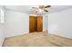 Bright bedroom features a ceiling fan and closet at 415 Haven Ln, Marietta, GA 30066