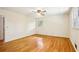 Bedroom features hardwood floors, natural light, and neutral walls at 415 Haven Ln, Marietta, GA 30066