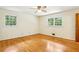 Spacious bedroom with natural light, hardwood flooring, and neutral walls at 415 Haven Ln, Marietta, GA 30066
