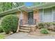 Close-up of the brick entrance, steps, and wrought iron railing to the front door at 415 Haven Ln, Marietta, GA 30066