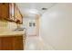 Basement kitchenette with wood cabinets and appliances at 415 Haven Ln, Marietta, GA 30066
