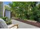 Private backyard featuring lush greenery and a serene outdoor space for relaxation at 4284 Cabretta Se Dr, Smyrna, GA 30080
