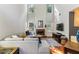Spacious living room with a fireplace, soaring ceilings, and gleaming hardwood floors at 4284 Cabretta Se Dr, Smyrna, GA 30080