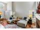 Open living room showcases hardwood floors, a fireplace, and neutral decor at 4284 Cabretta Se Dr, Smyrna, GA 30080