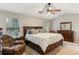 Spacious main bedroom suite with vaulted ceiling, fan, and ample natural light at 4284 Cabretta Se Dr, Smyrna, GA 30080