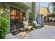 Relaxing outdoor patio with chairs, storage, and easy access to green space at 4284 Cabretta Se Dr, Smyrna, GA 30080