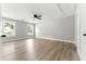 Large bedroom with natural light and luxury vinyl floors provides a clean and cozy atmosphere at 124 Sims Dr, Hiram, GA 30141