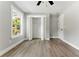 Bedroom with hardwood floors, closet and window. Lots of natural light at 124 Sims Dr, Hiram, GA 30141