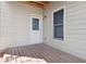 Enclosed outdoor porch with white door and window, for relaxation at 189 Privet Cir, Suwanee, GA 30024