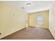 Bright bedroom featuring neutral walls, carpeted floor, and natural light at 189 Privet Cir, Suwanee, GA 30024