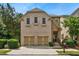 Charming brick and stone home with a two-car garage and well-maintained landscaping at 189 Privet Cir, Suwanee, GA 30024