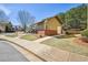 Charming community building featuring a red brick base and covered patio area with black metal fencing at 189 Privet Cir, Suwanee, GA 30024