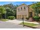 Beautiful home with a brick and stone exterior, a two-car garage, and lush green landscaping at 189 Privet Cir, Suwanee, GA 30024