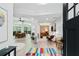 Inviting home entryway with a colorful rug, modern decor, and open floor plan at 2349 Echo Cliff Ne Ct, Atlanta, GA 30345