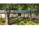 Charming one-story home with a brick walkway and mature trees, offering a serene and inviting entrance at 2349 Echo Cliff Ne Ct, Atlanta, GA 30345