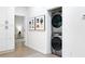 Convenient laundry area with modern washer and dryer, storage cabinets and stylish decor at 2349 Echo Cliff Ne Ct, Atlanta, GA 30345