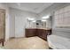 Luxurious bathroom with a soaking tub, double vanity, and walk-in shower at 255 Wembley Cir, Atlanta, GA 30328