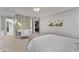 Well-lit bedroom featuring a cozy bed, desk area, and decorative wall art creating a serene space at 255 Wembley Cir, Atlanta, GA 30328