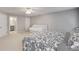 Bright bedroom with one queen bed and a daybed, featuring neutral walls and carpet at 255 Wembley Cir, Atlanta, GA 30328