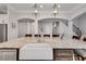 Eat-in kitchen island with stone countertop and large sink, with seating for four at 255 Wembley Cir, Atlanta, GA 30328