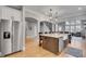 Spacious eat-in kitchen with stainless steel appliances and a center island with stone countertops at 255 Wembley Cir, Atlanta, GA 30328