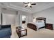 Comfortable main bedroom featuring an ensuite bathroom and tray ceilings at 255 Wembley Cir, Atlanta, GA 30328