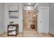 Stylish shower with glass doors, rainfall showerhead, and tiled walls, complemented by a modern decor at 255 Wembley Cir, Atlanta, GA 30328