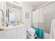 A bathroom with a tile floor, white vanity, and a shower and tub combo at 302 Shawnee Indian Ln, Suwanee, GA 30024