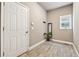 Entryway with tile floors, natural light, and a convenient transition from outdoors at 302 Shawnee Indian Ln, Suwanee, GA 30024