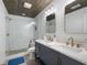 Modern bathroom featuring double sinks, subway tile shower, and contemporary fixtures at 3600 Morishop Nw Cv, Marietta, GA 30064
