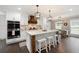 Spacious kitchen and dining area featuring a large island and modern appliances at 3600 Morishop Nw Cv, Marietta, GA 30064