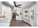 Kitchen eat-in area with hardwood floors and lots of windows to the deck at 3600 Morishop Nw Cv, Marietta, GA 30064